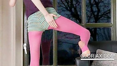 Teen blonde streaches her hot body