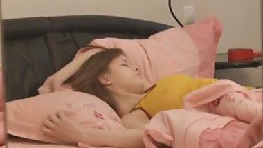 Busty teenager fingering pussy