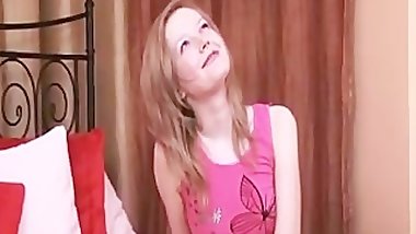 Sexy redhair sitting on the bed