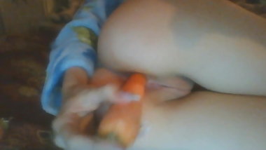 Busty russian teen Svetlana bates with a bottle and a carrot