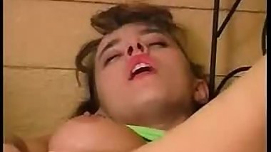 Cute russian pigtailed girl Krista playing with a banana