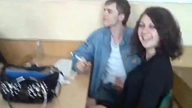 Russian girl jacks off her friend in class!