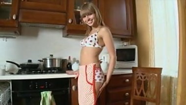 Sexy teen Aina rides huge dildo in the kitchen