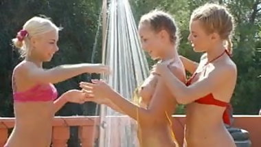 Lesbian schoolgirls go wild by the pool